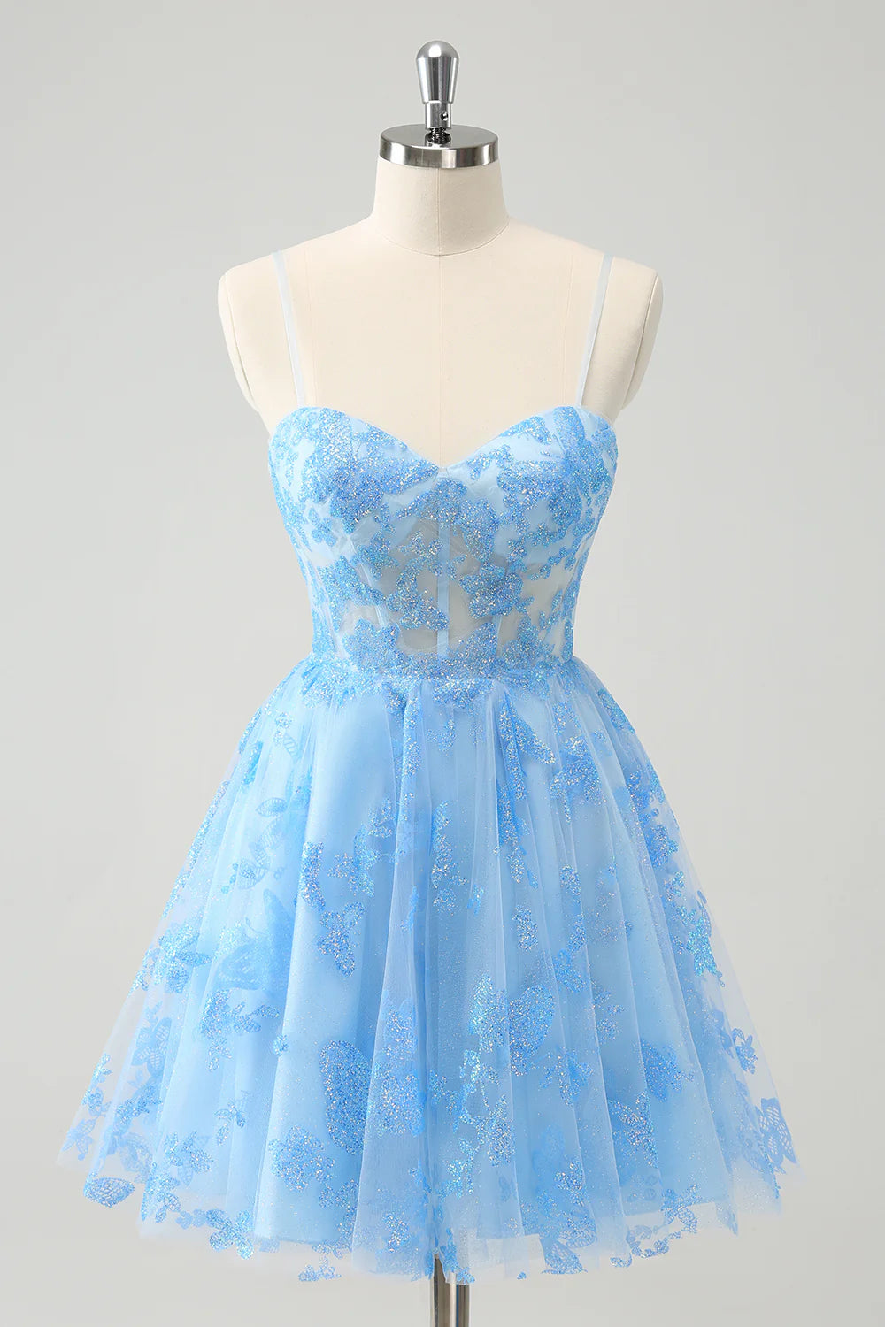 Front view of a luminous blue A-line homecoming dress with butterfly pattern.