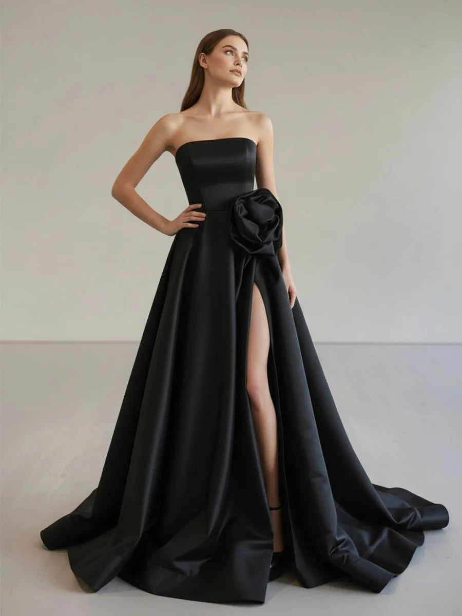 Luxurious Black Satin Strapless Square Neckline Structured Corset Bodice 3D Floral Waist Applique High-Slit A-Line Silhouette Crisscross Lace-Up Back Sweeping Train Evening Dress