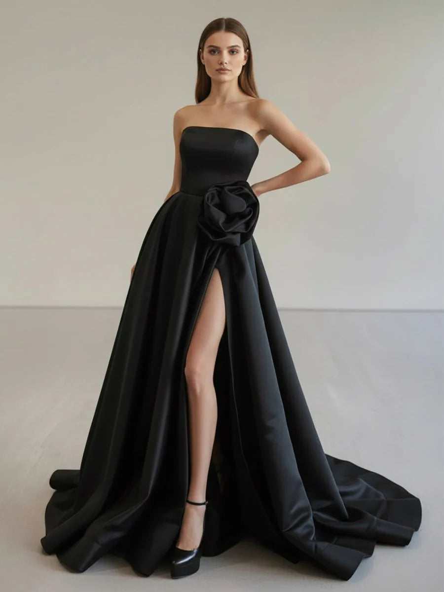 Luxurious Black Satin Strapless Square Neckline Structured Corset Bodice 3D Floral Waist Applique High-Slit A-Line Silhouette Crisscross Lace-Up Back Sweeping Train Evening Dress