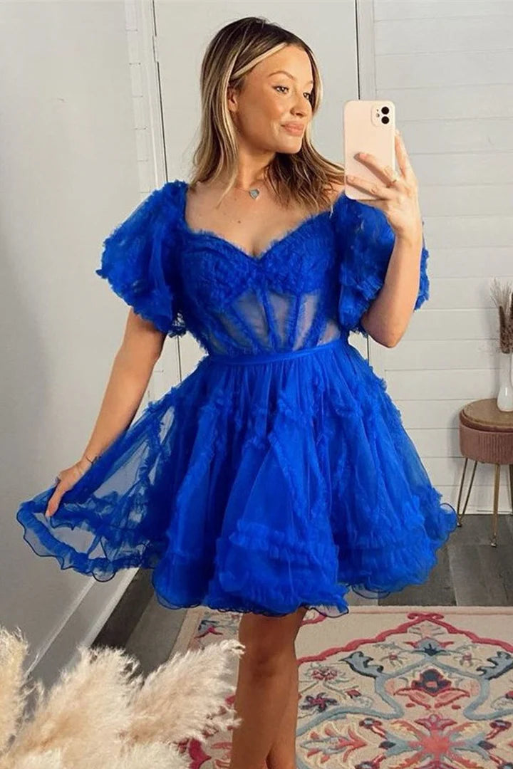 Royal blue A-line tulle homecoming dress with V-neck and long sleeves.