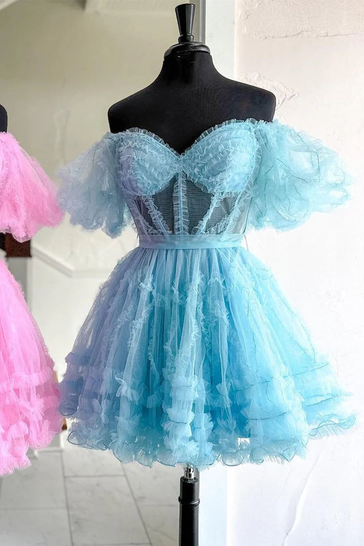 Blue A-line tulle homecoming dress with V-neck and long sleeves.
