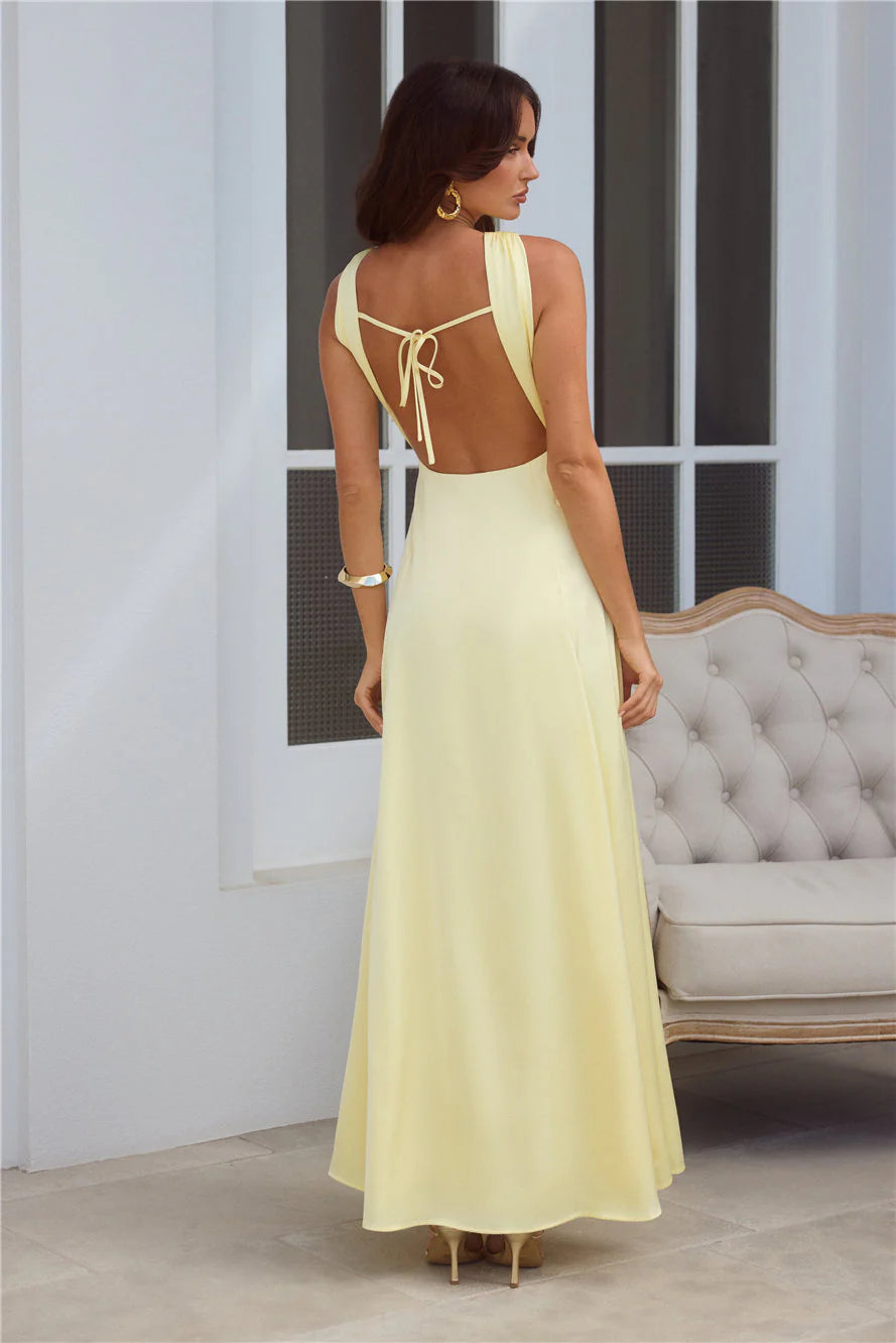 Pale Yellow Halter Neck Cutout Tie Back Maxi Evening Dresses