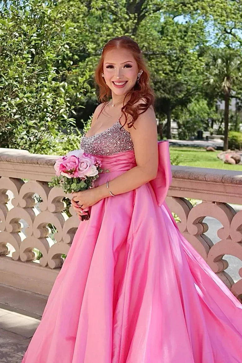 Pink Satin Ball Gown Prom Dress with Beaded Bodice and Oversized Back Bow