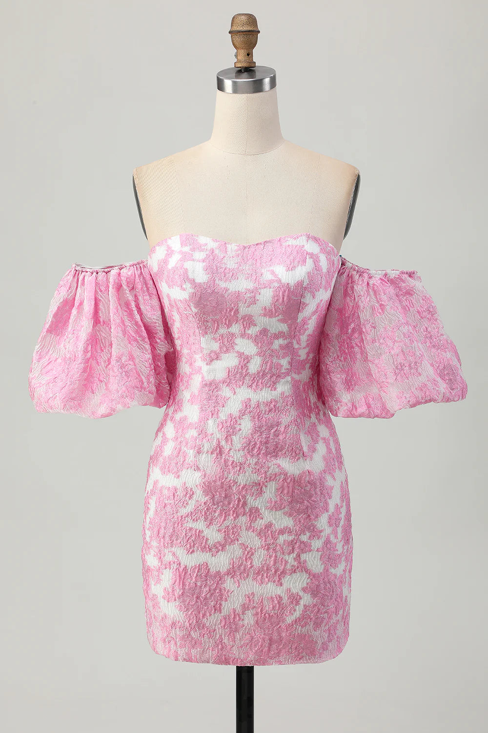 Printed pink strapless homecoming dress with removable sleeves.