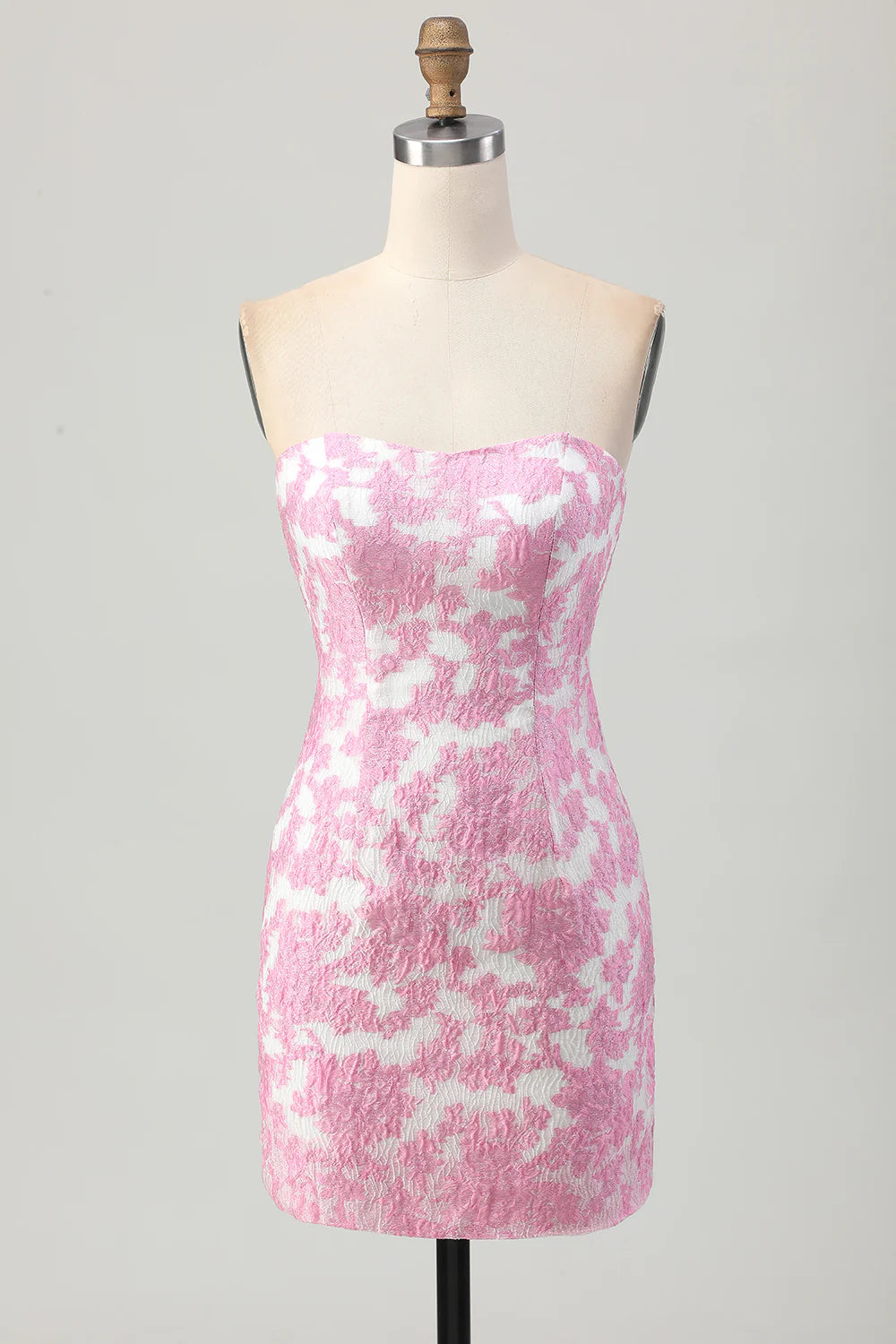 Close-up of the floral print on the pink homecoming dress.