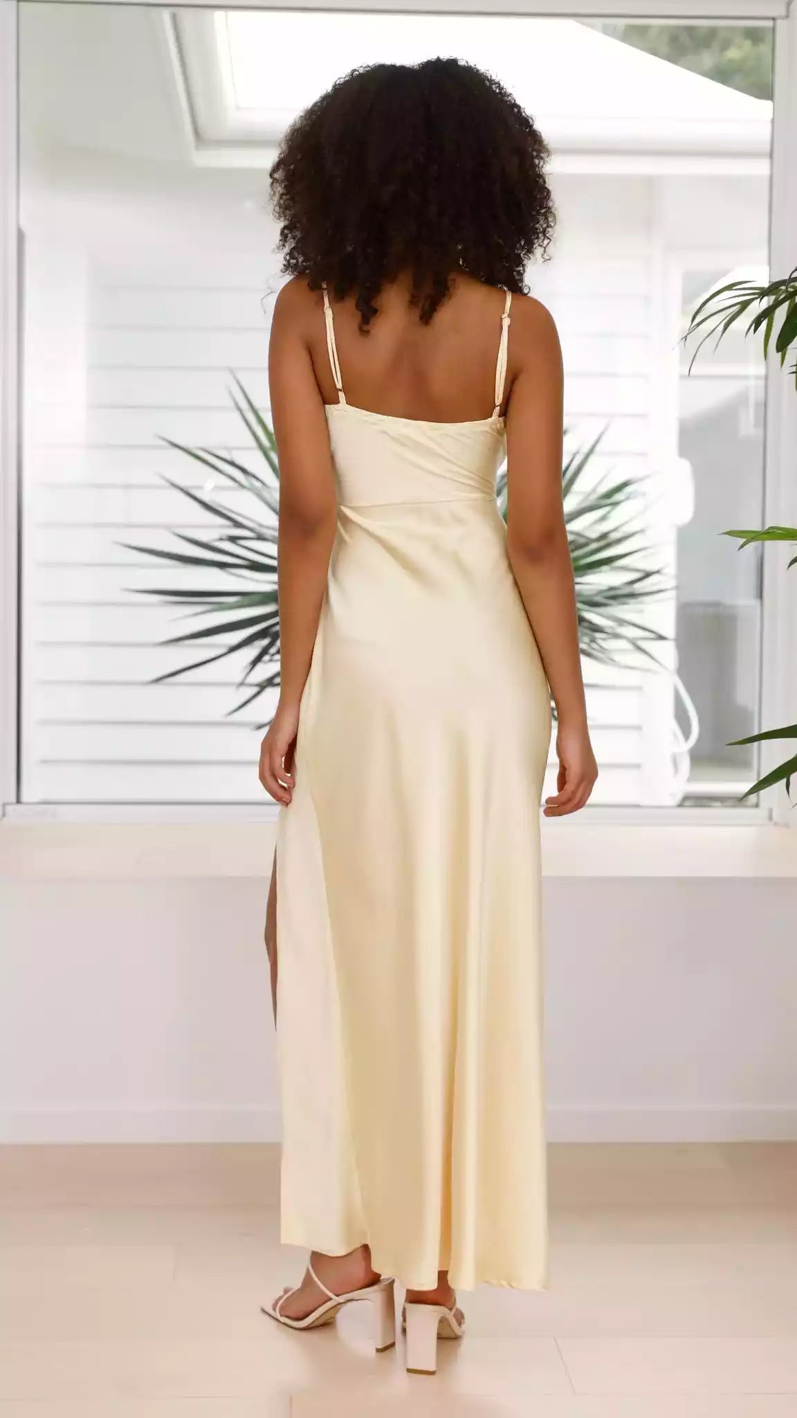 Prom Dresses features eye-catching straight neck adjustable shoulder straps with slit and pleated details for a perfect look