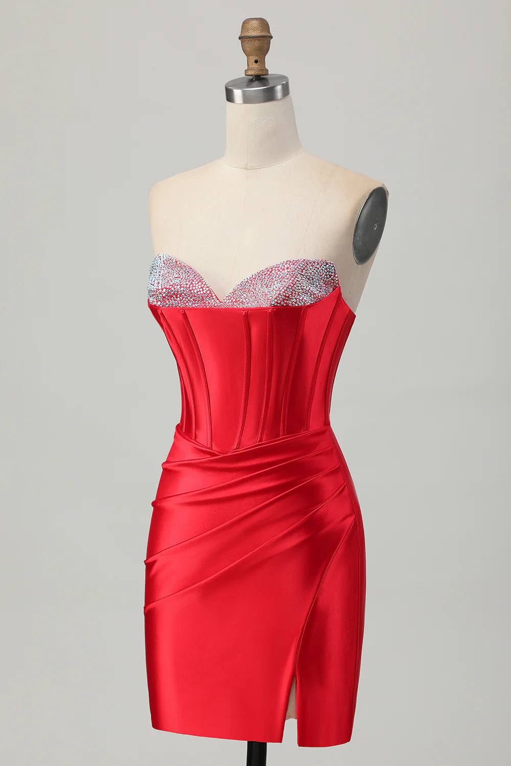 Back view of a model wearing a red bodycon strapless satin short homecoming dress, highlighting the fitted silhouette.