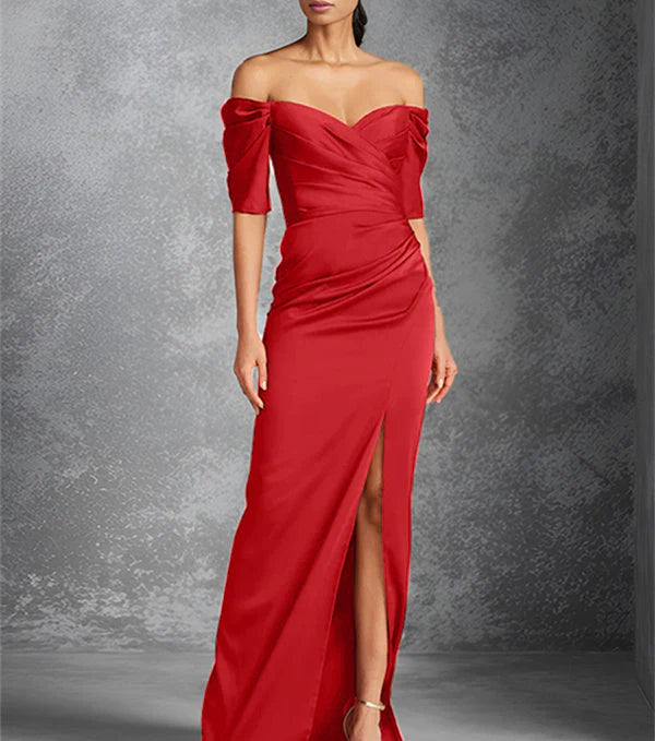 Tight off shoulder short sleeved floor standing bridal dress with front slit