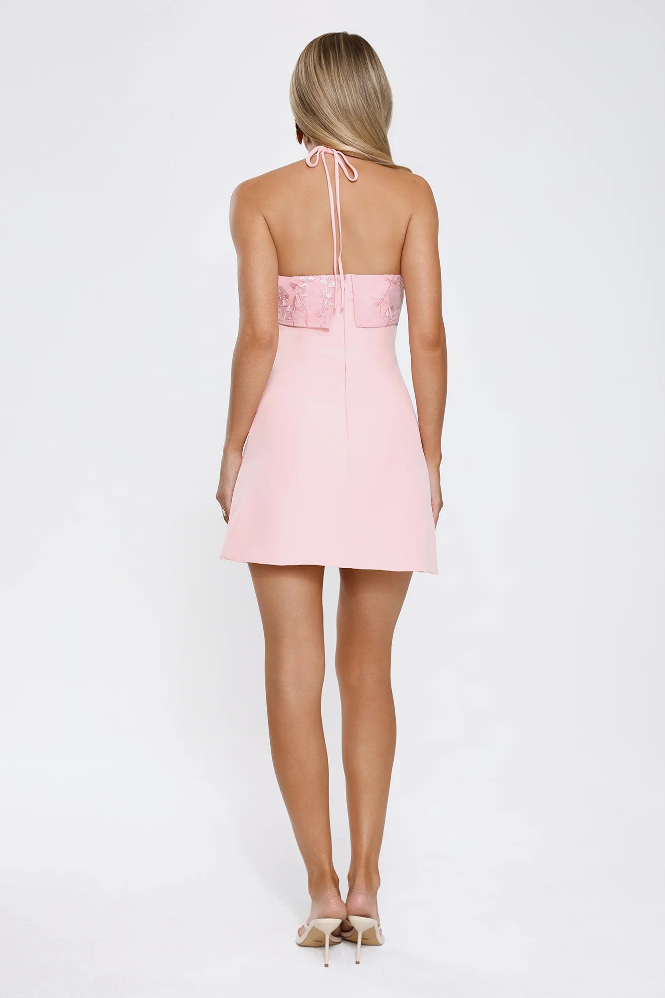 Romantic Blush Pink Halter Mini Dress with Floral Lace Bust Panel, Open Back Tie Closure and Flared A-Line Silhouett