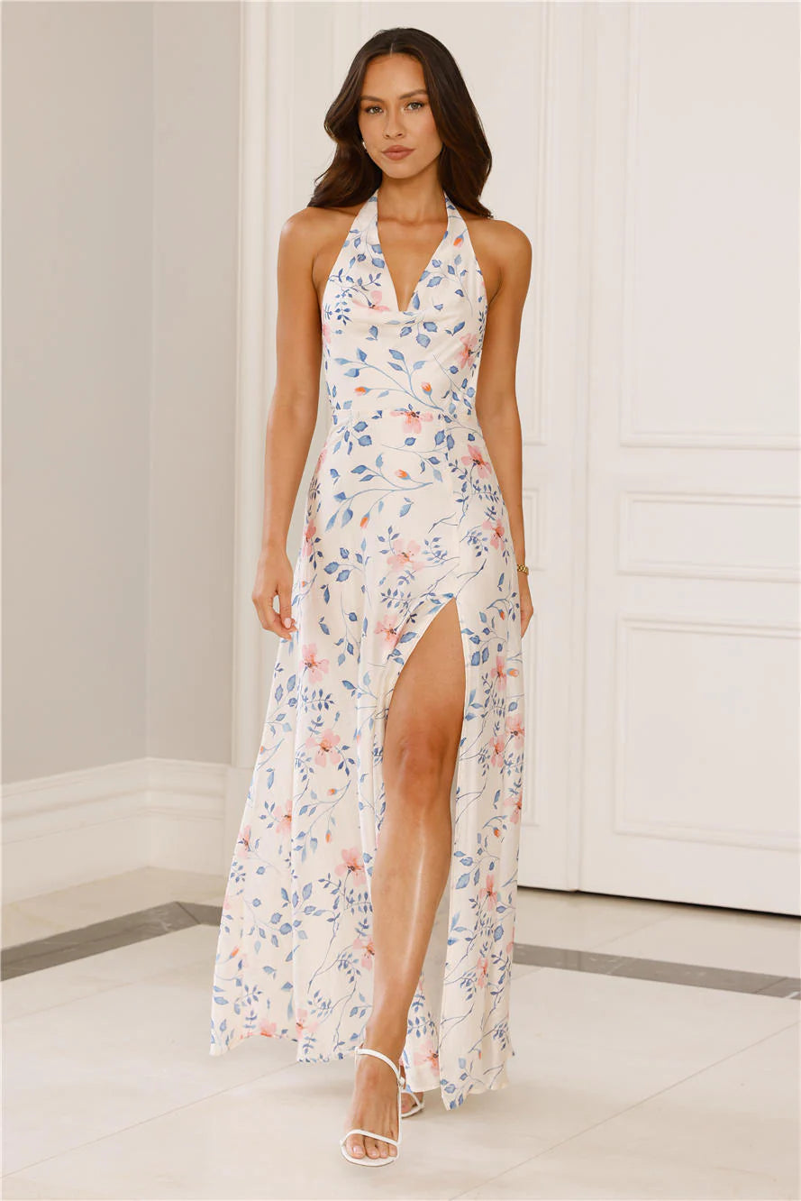 Romantic Cream Floral Halter Maxi Dress with Cowl Neckline, Open Back Tie Closure, High Thigh Slit and Flowing A-Line Skirt