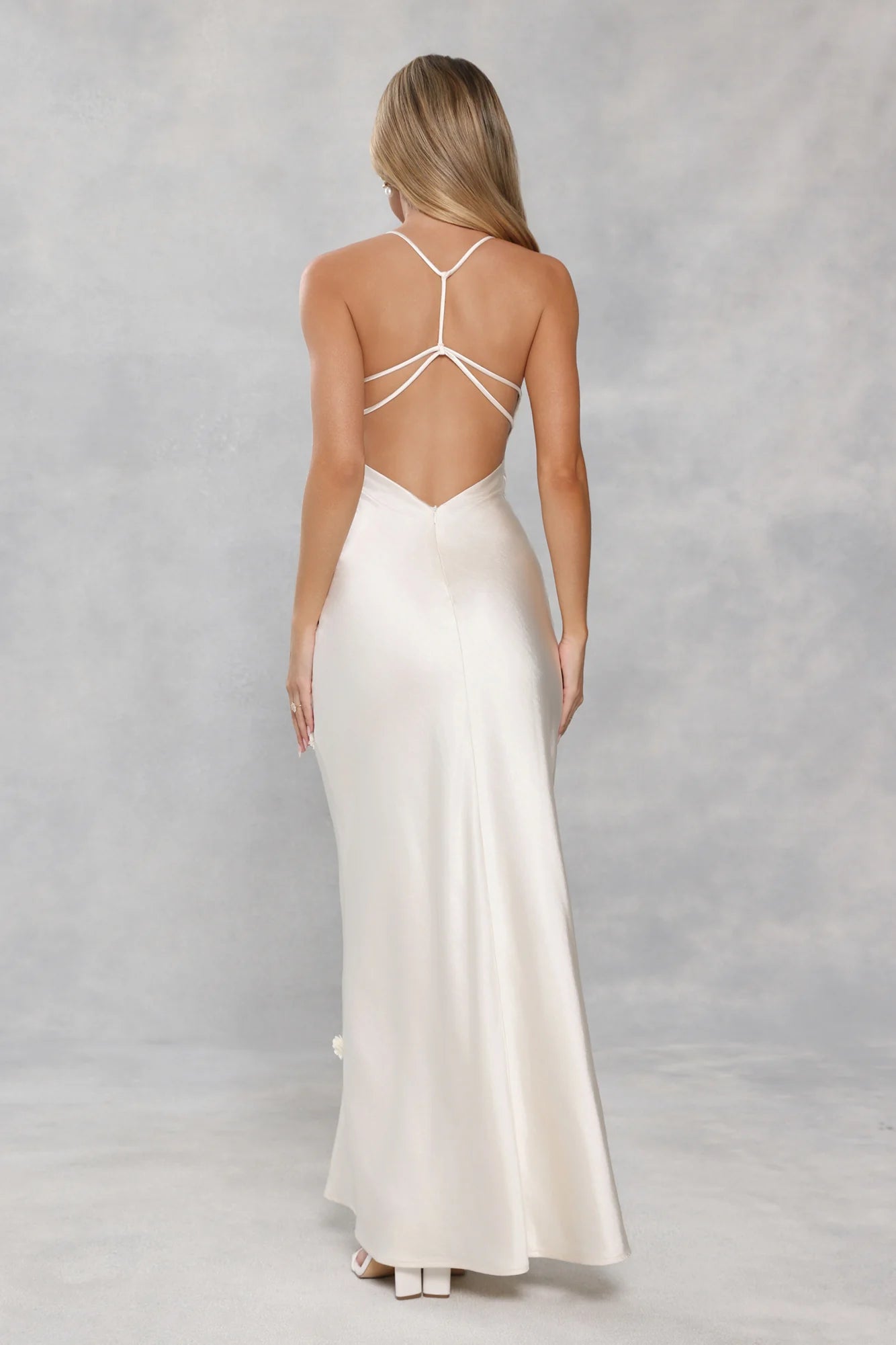 Romantic Ivory Satin Maxi Dress with 3D Floral Appliqués, Crisscross Strappy Open Back and Form-Fitting Silhouette