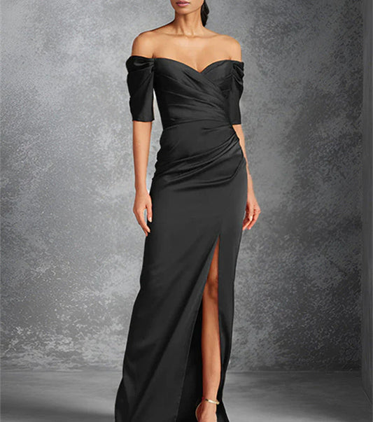 Tight off shoulder short sleeved floor standing bridal dress with front slit
