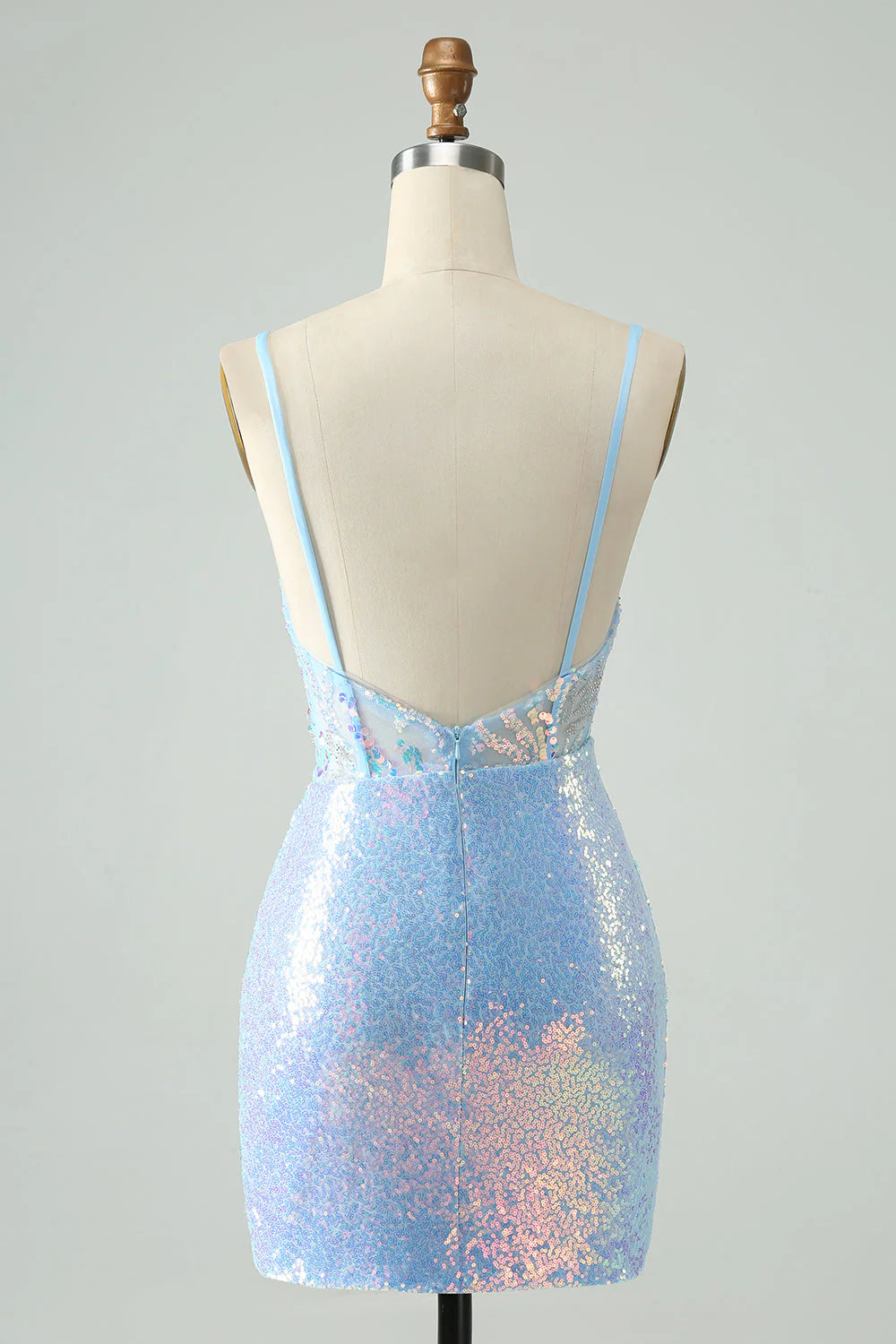 Side view of the light blue sequined homecoming dress, showing the fitted corset and short skirt.