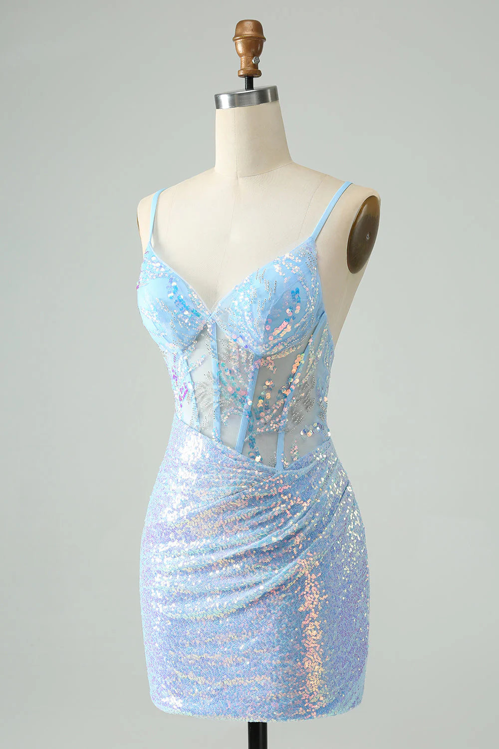 Close-up of the light blue glitter dress bodice, highlighting the sequins and spaghetti straps.