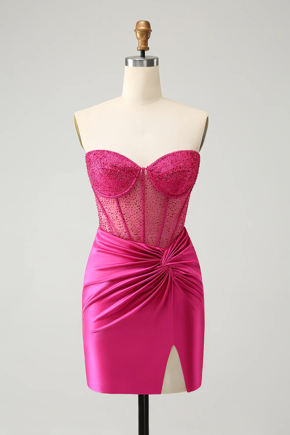 Hot pink glitter strapless homecoming dress with pleated corset and beading.
