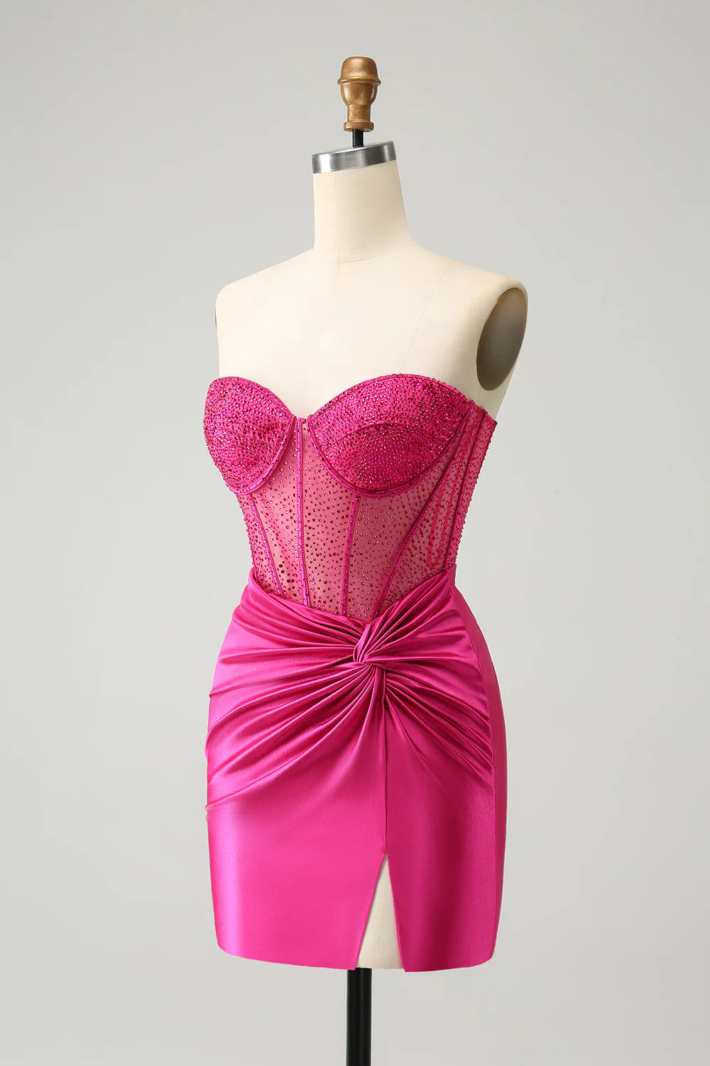 Side view of hot pink glitter pleated homecoming dress with sparkling beading.