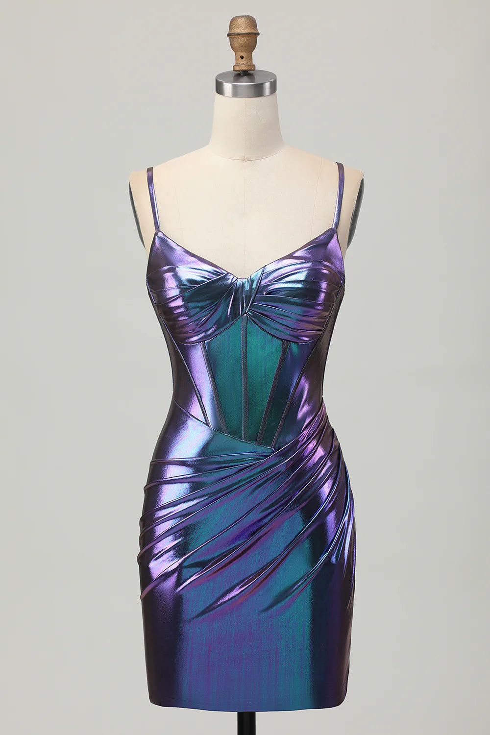 Model wearing a shimmering metallic blue purple bodycon corset short homecoming dress.