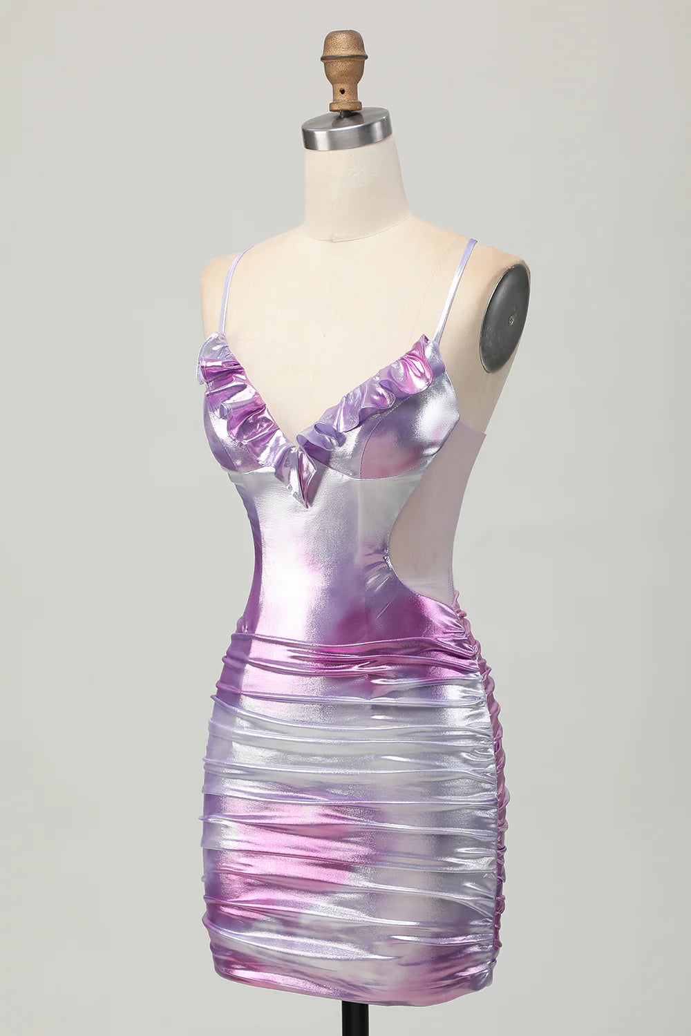 Close-up of the metallic fabric and cut-out detail on the silver purple dress.