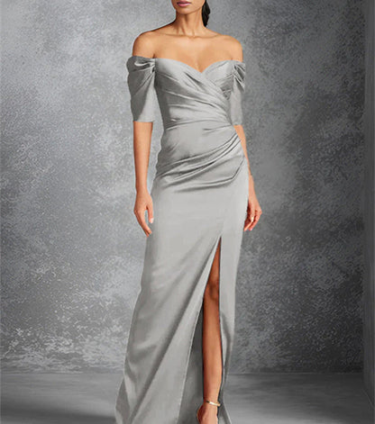 Tight off shoulder short sleeved floor standing bridal dress with front slit