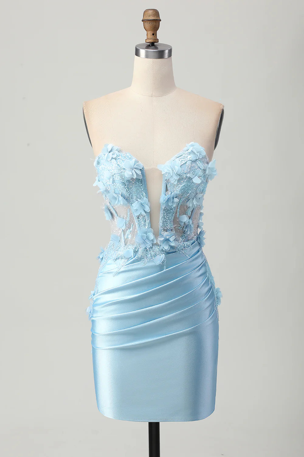 Model wearing a sky blue strapless sequined short homecoming dress with 3D flowers.
