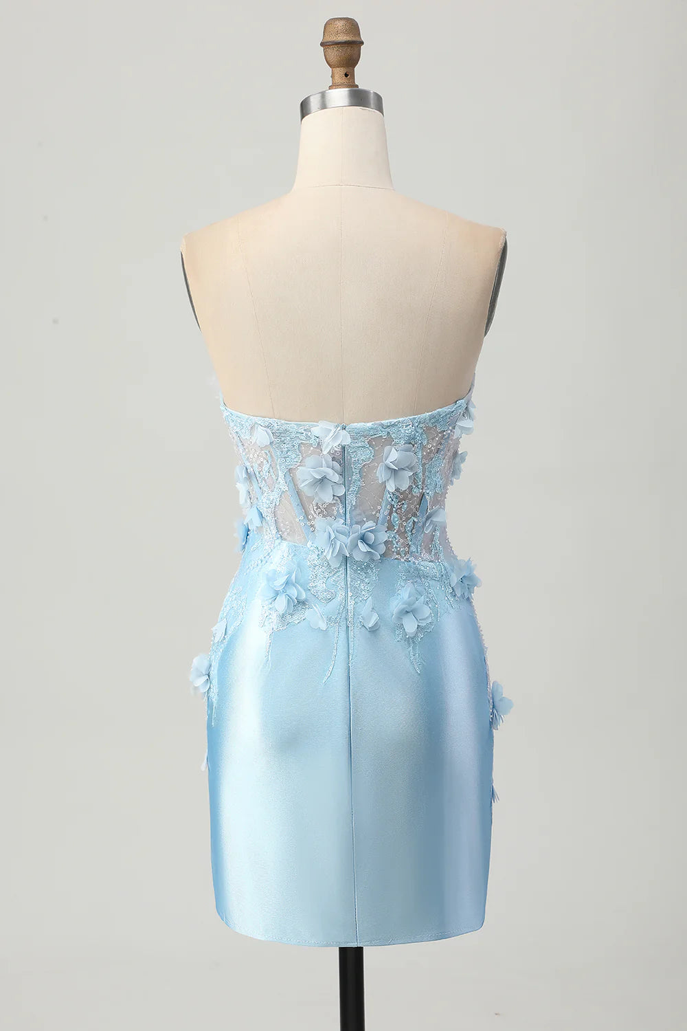 Back view of the sky blue strapless sequined short homecoming dress.