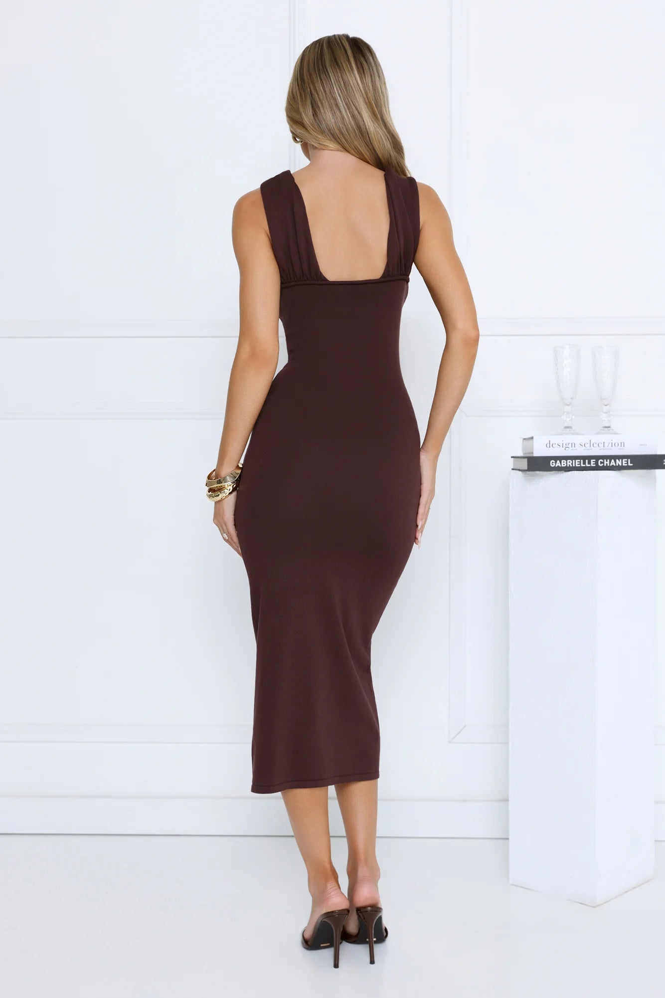 Sleek Chocolate Brown Halter Neck Midi Dress with Gold Buckle Accent, Form-Fitting Bodycon Silhouette, Low Square Open Back and Flared Mermaid Hem