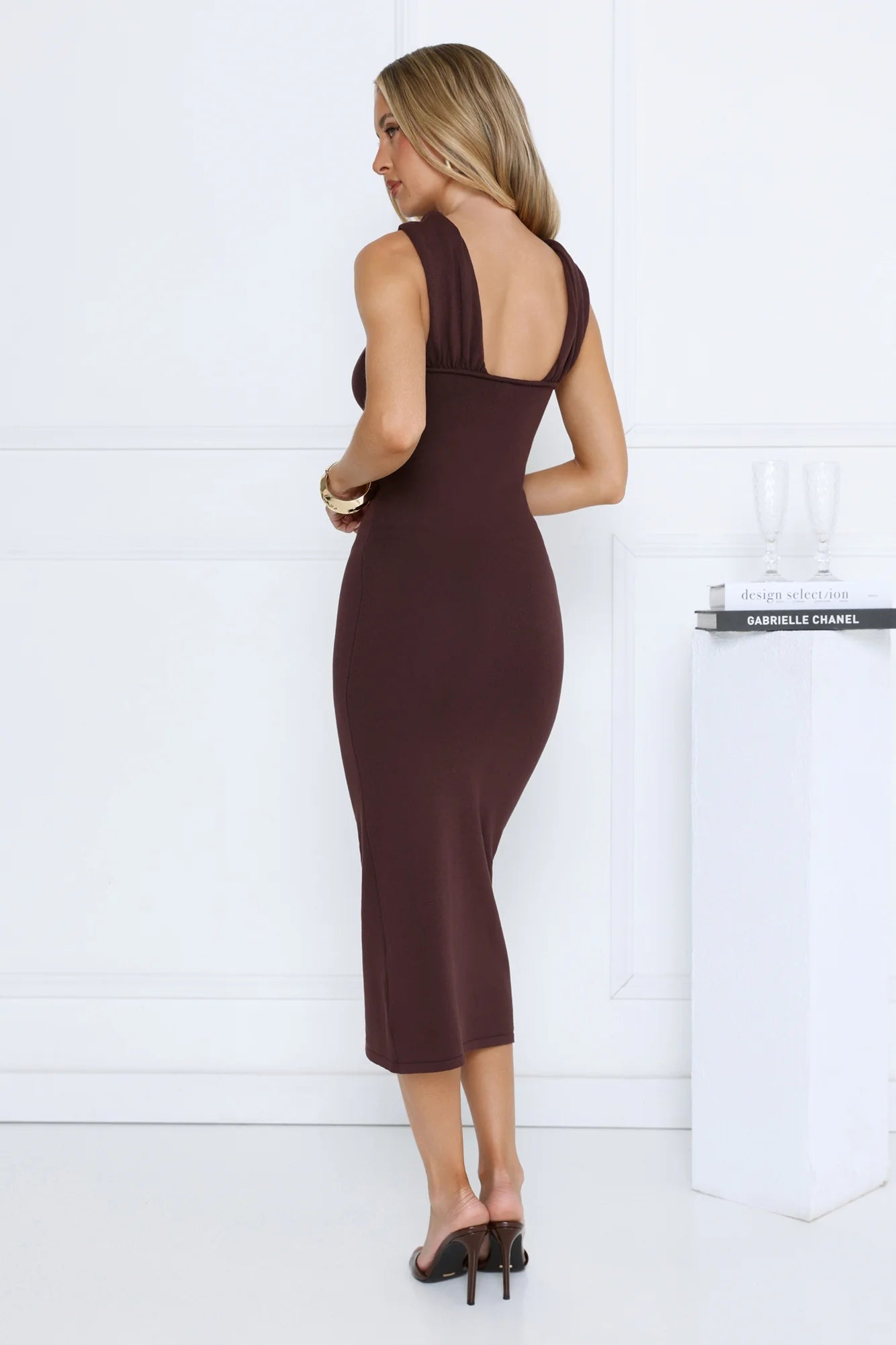 Sleek Chocolate Brown Halter Neck Midi Dress with Gold Buckle Accent, Form-Fitting Bodycon Silhouette, Low Square Open Back and Flared Mermaid Hem