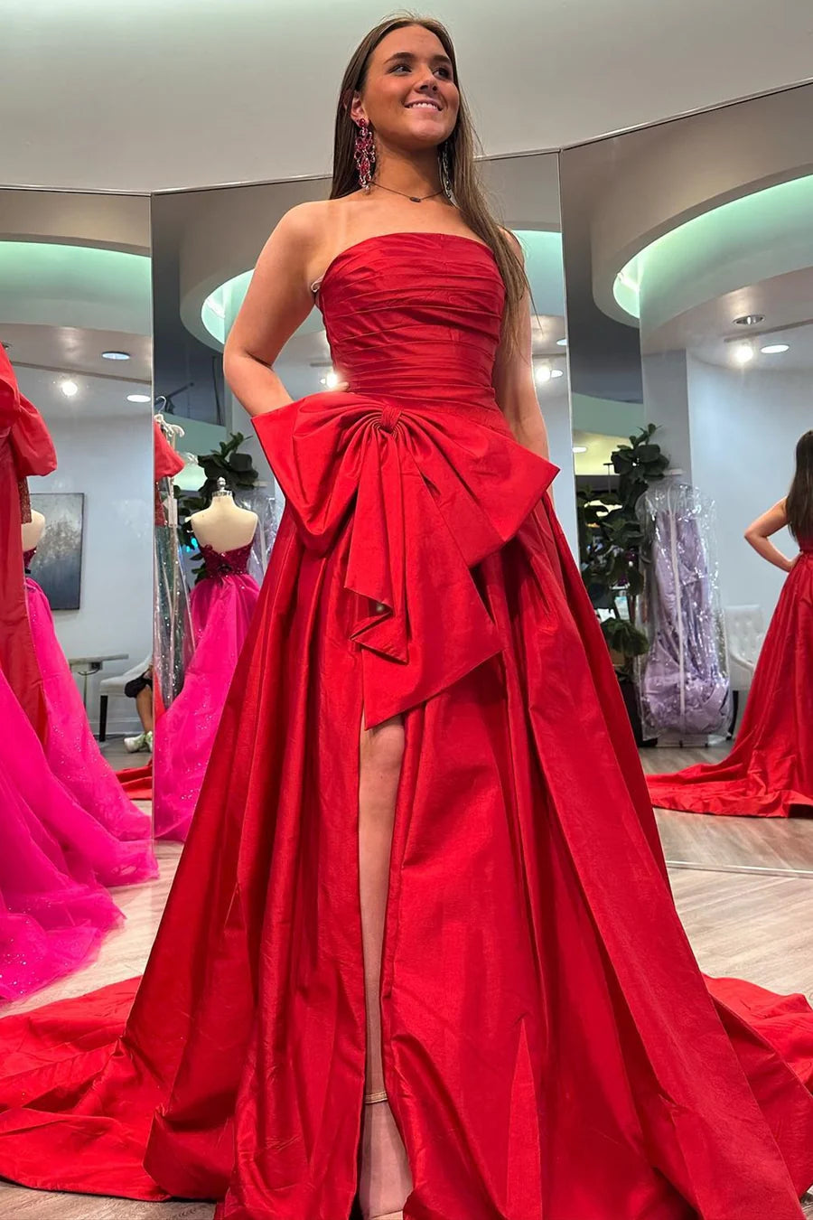 Sleeveless strapless A-line bow ball gown