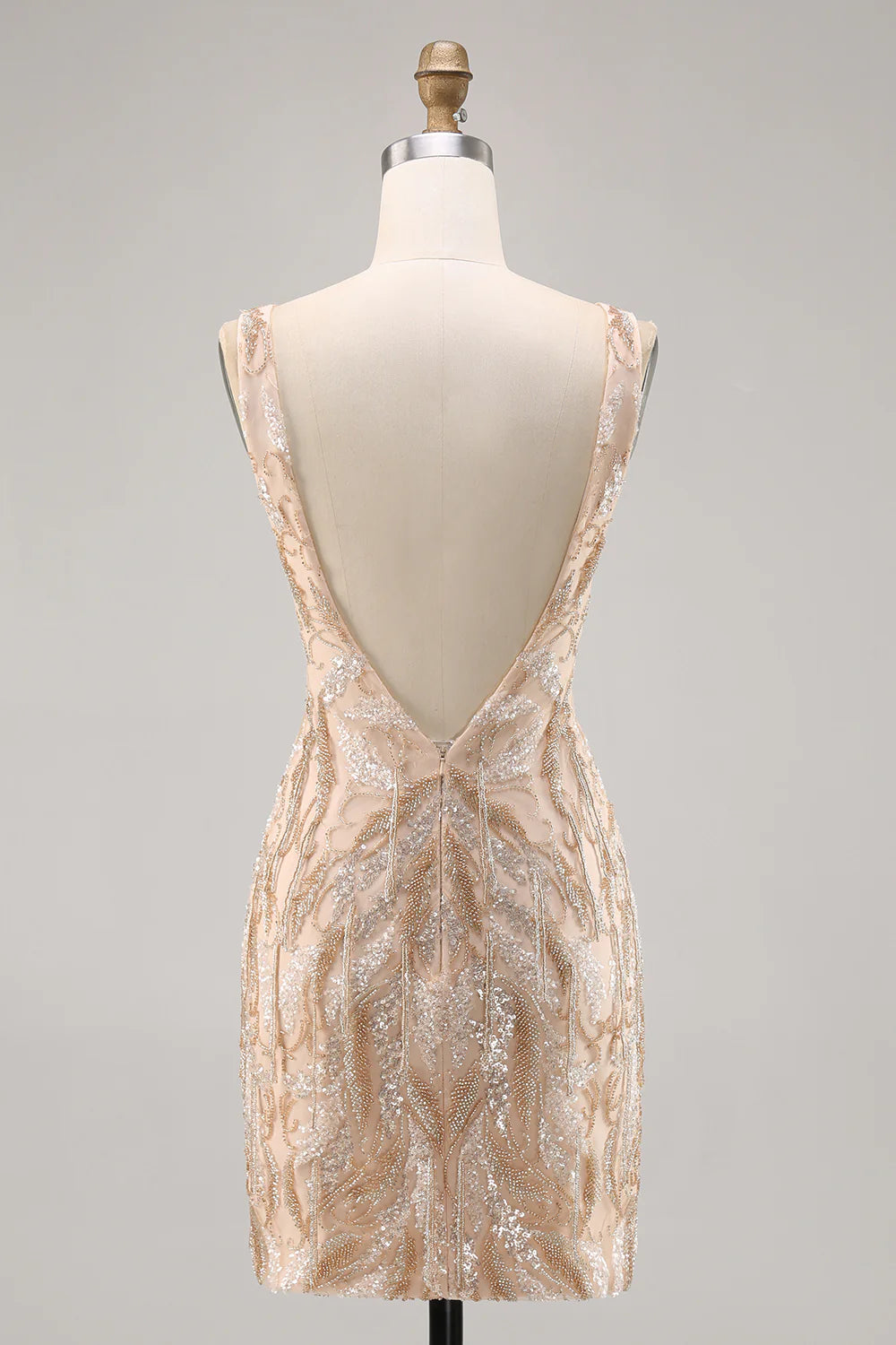 Side view of the champagne sequined V-neck bodycon dress, showcasing its fitted silhouette.