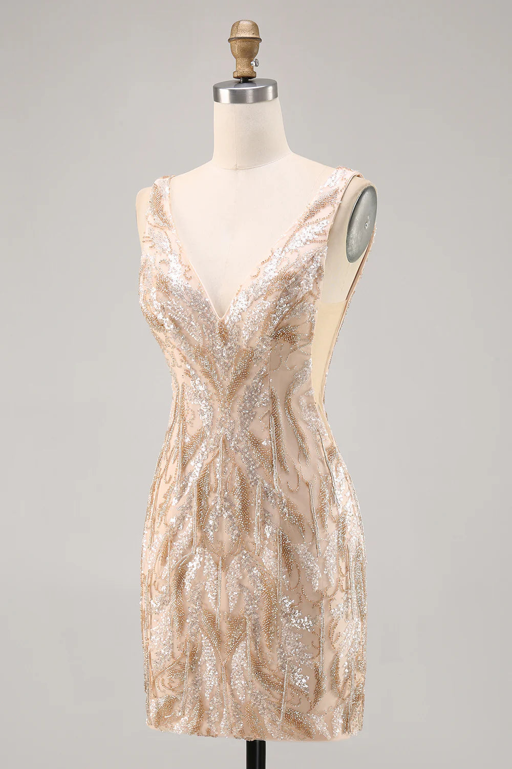 Back view of the elegant champagne V-neck sequined homecoming dress.