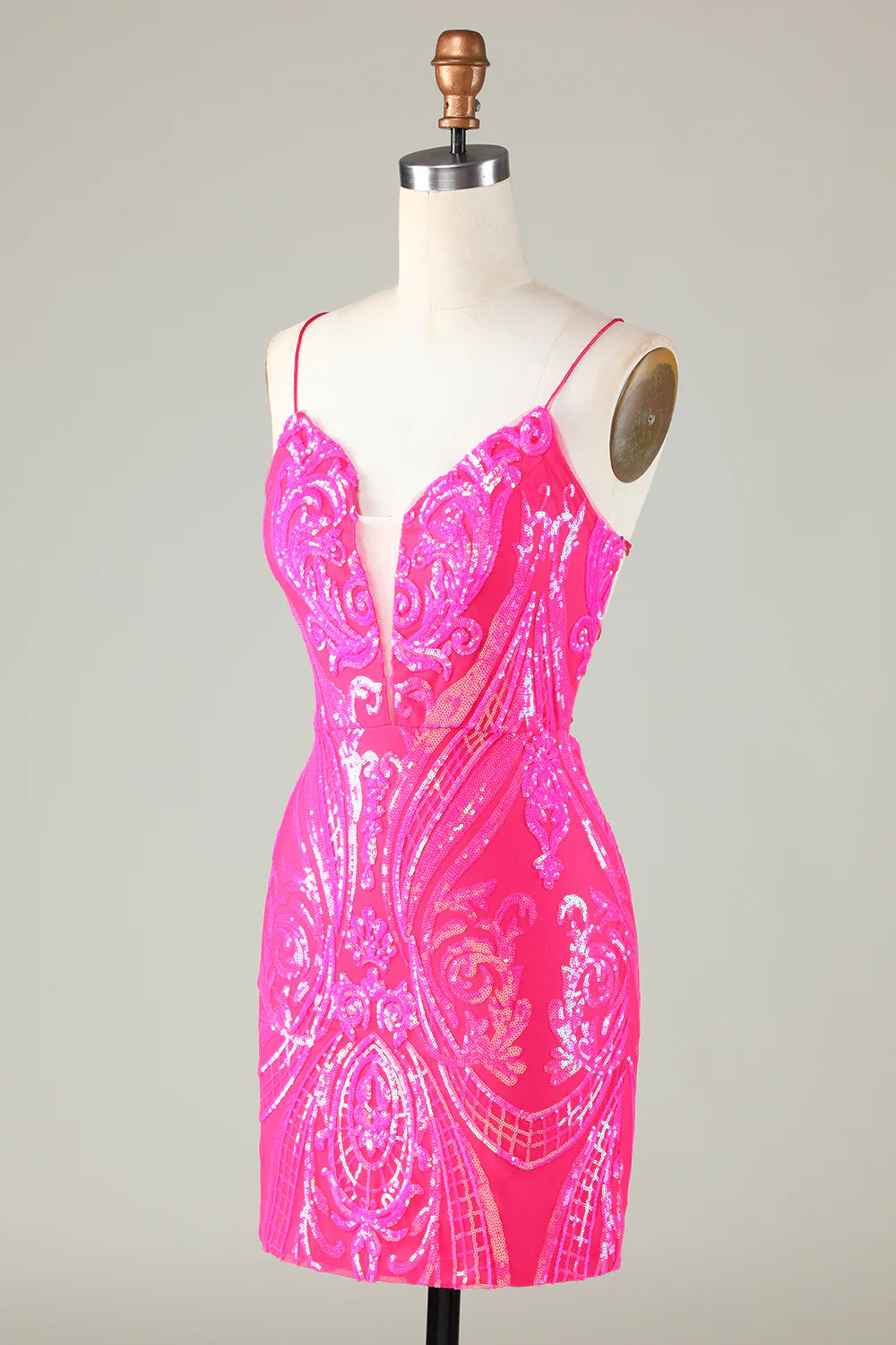 Back view of the hot pink glitter dress showing the lace-up detail.