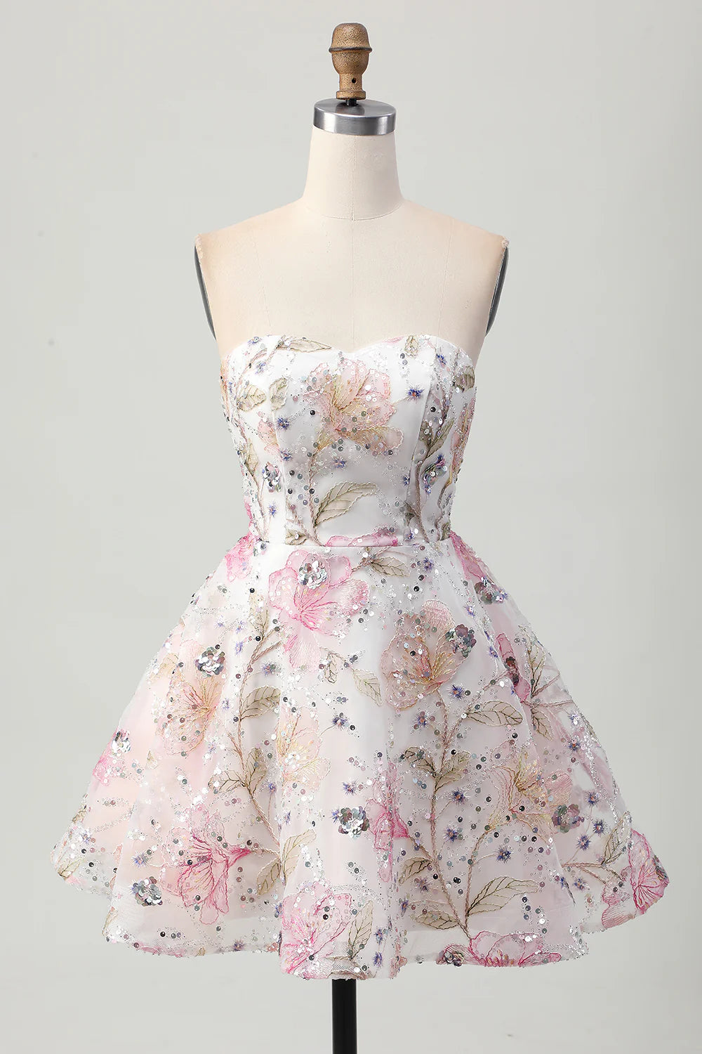 Front view of a pink floral A-line strapless short homecoming dress with sequins.