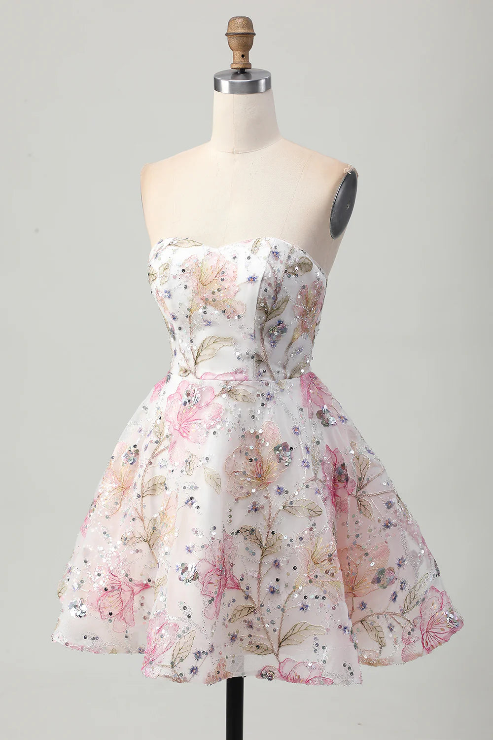Back view of a pink floral A-line strapless short homecoming dress with sequins.