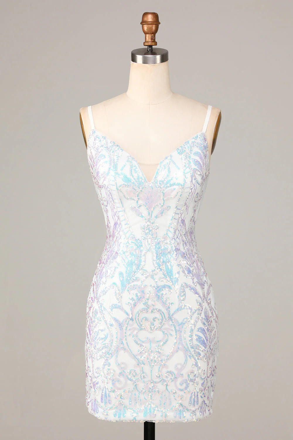 Front view of a sparkling white sequin sheath homecoming dress with spaghetti straps.