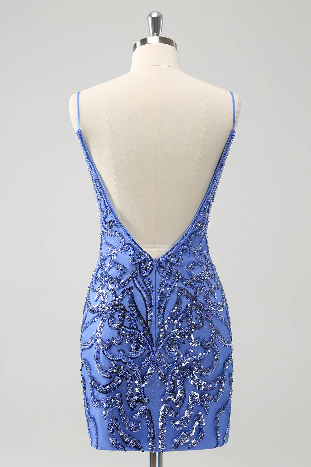 Close-up of the shimmering blue sequin fabric and delicate spaghetti straps.