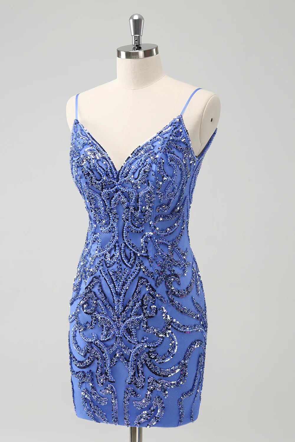 Back view of the sparkling blue spaghetti strap short sequin dress.