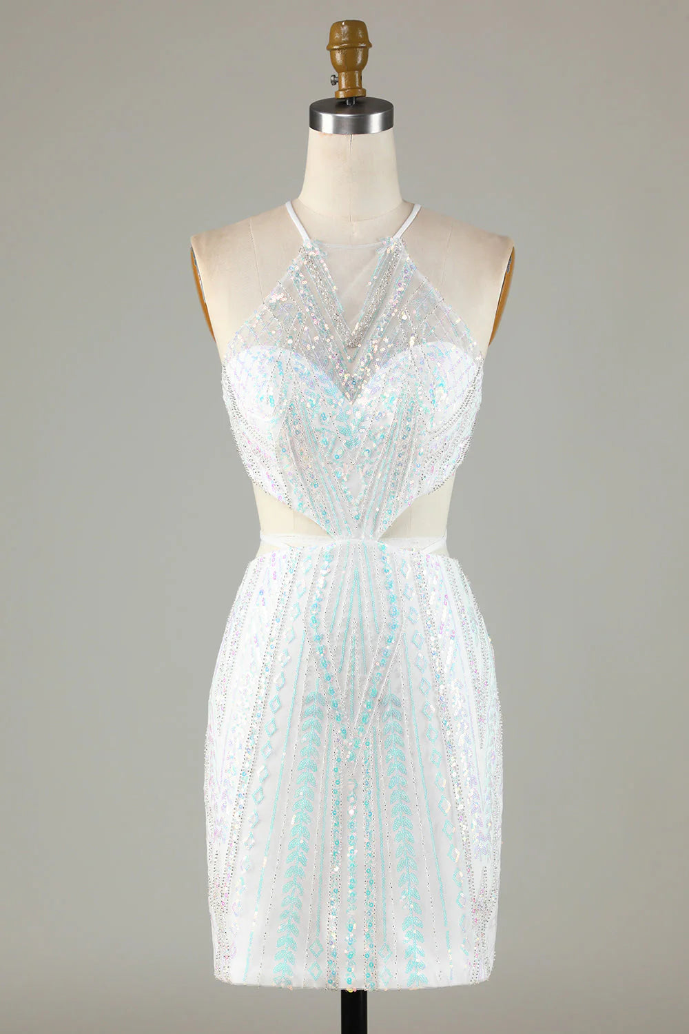 Model wearing a white sequin halter homecoming dress with a tight fit and lace-up back.