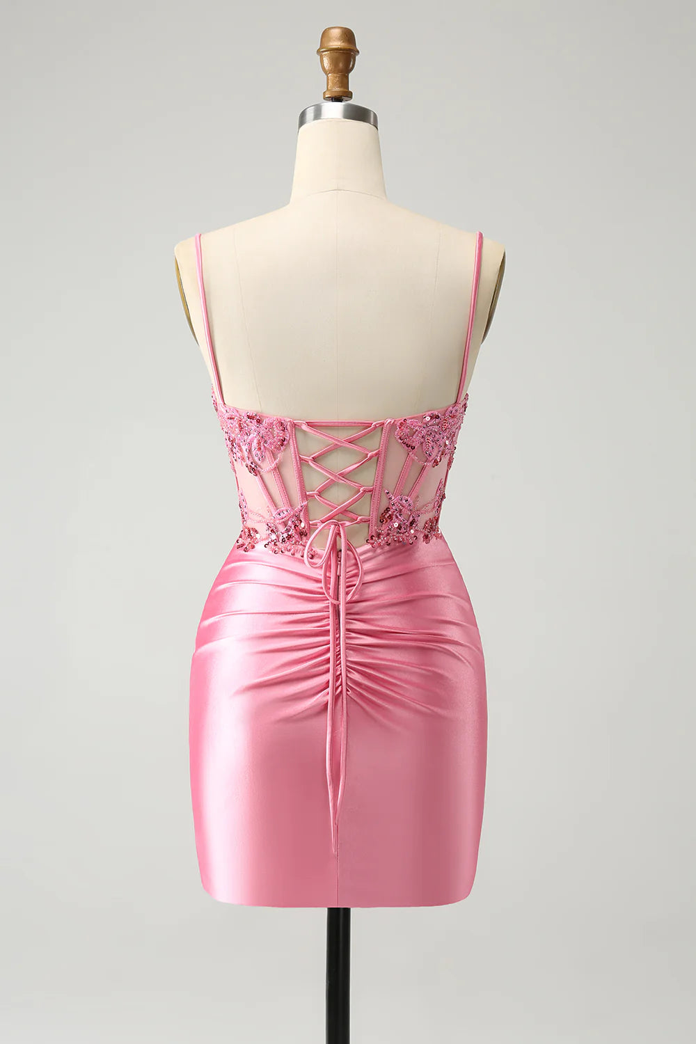 Close-up of the pleated corset and sequin details on the pink glitter homecoming dress.