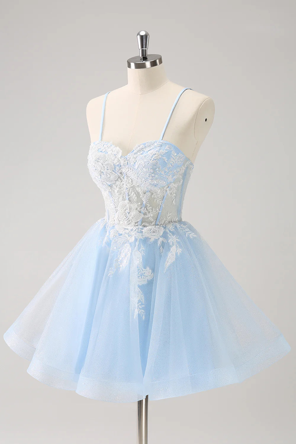 Back view of the blue A-line short homecoming dress with corset detailing.