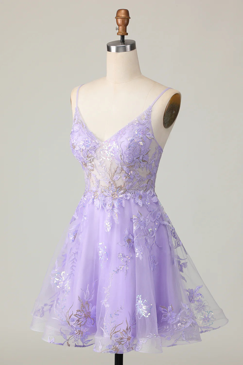 Back view of a sparkly purple A-line strapless homecoming dress, showcasing its elegant silhouette.