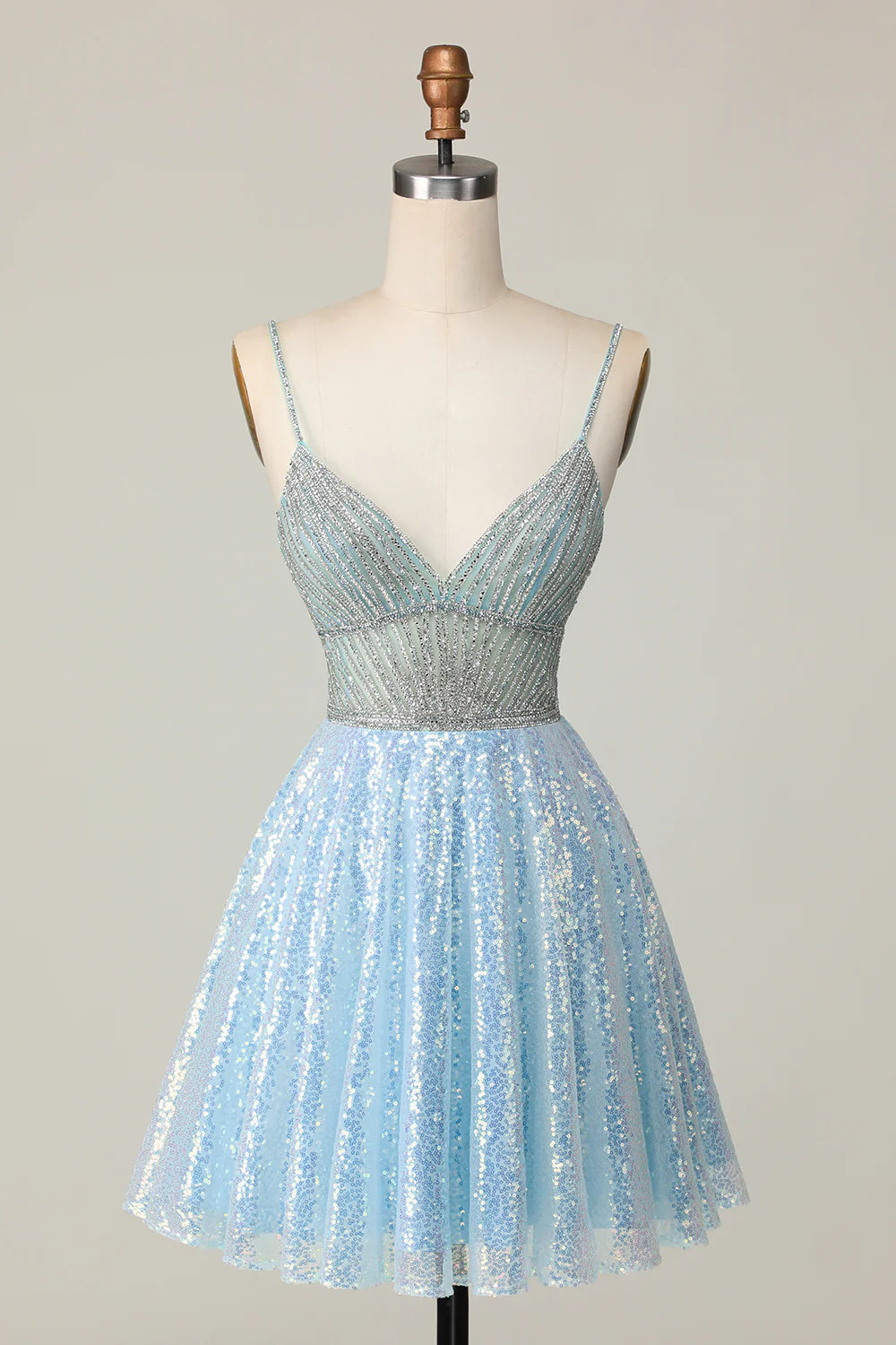 Front view of a sparkly A-line light blue sequined homecoming dress.