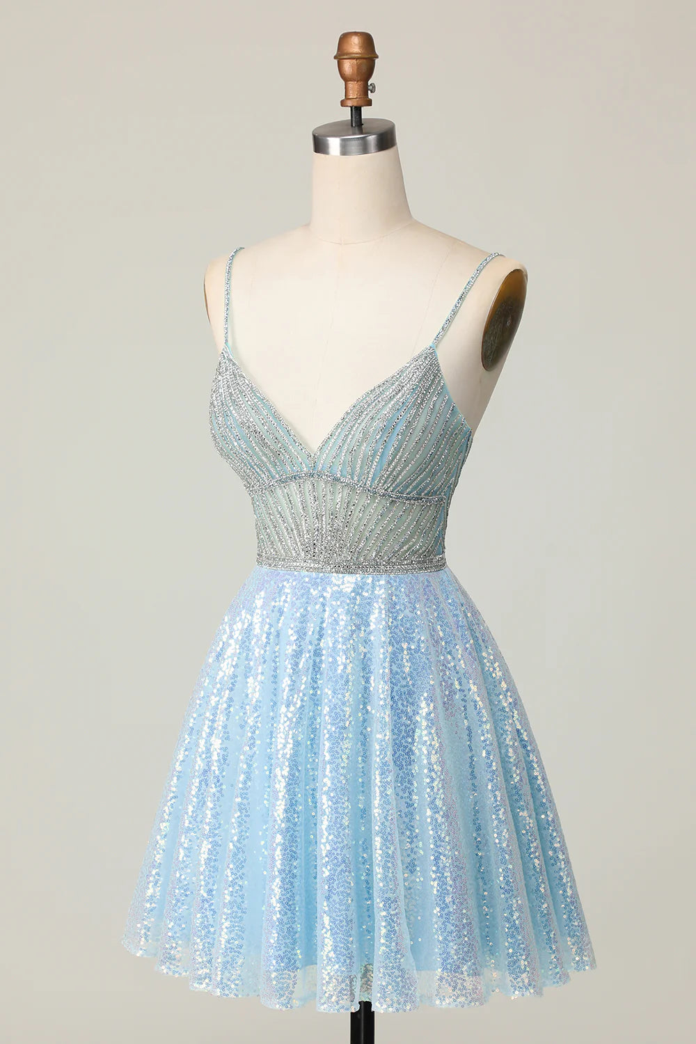 Back view of a sparkly A-line light blue sequined homecoming dress.