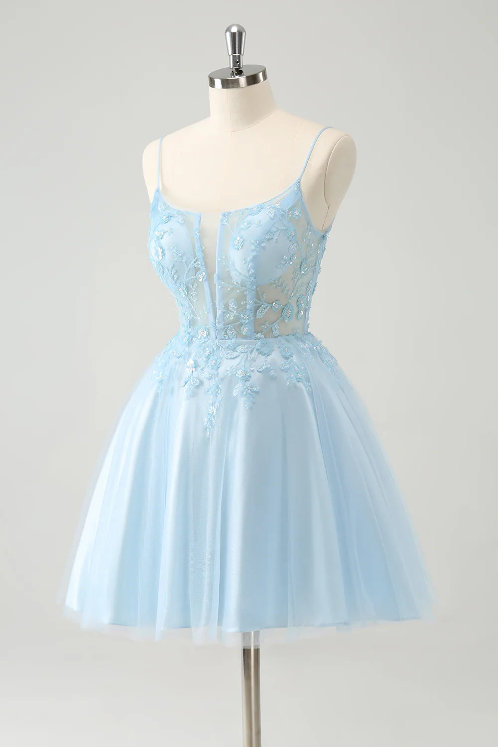 Back view of the blue A-line homecoming dress showing the lace-up corset detail.