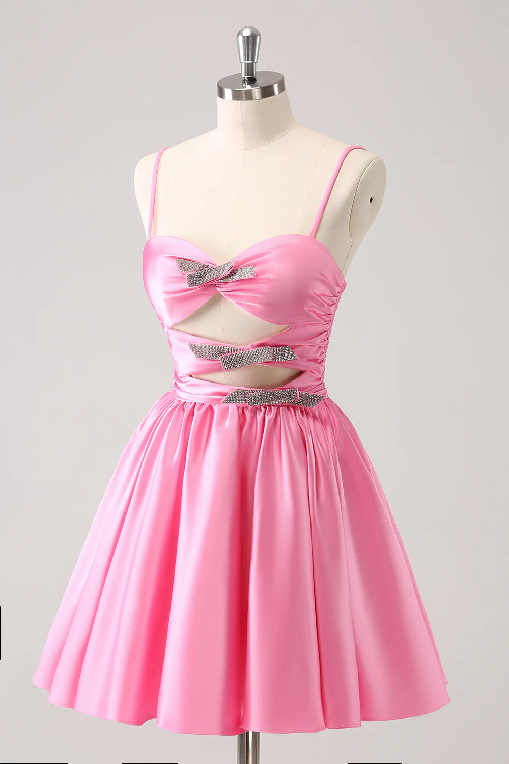Back view of the pink A-line formal dress, showcasing the sequin details and flowing skirt.