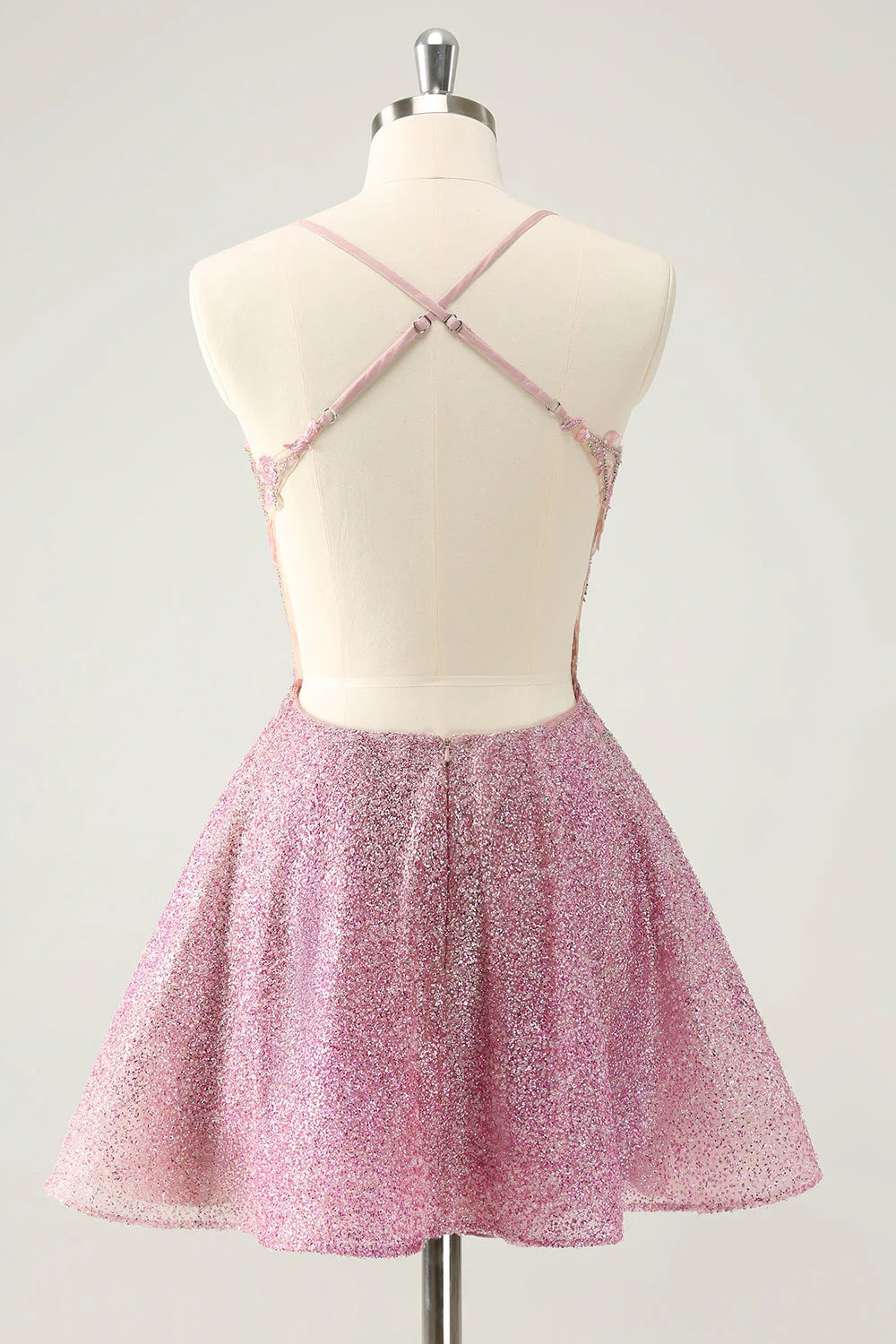 Back view of the dark pink A-line homecoming dress, showcasing the corset detail and shimmering fabric.