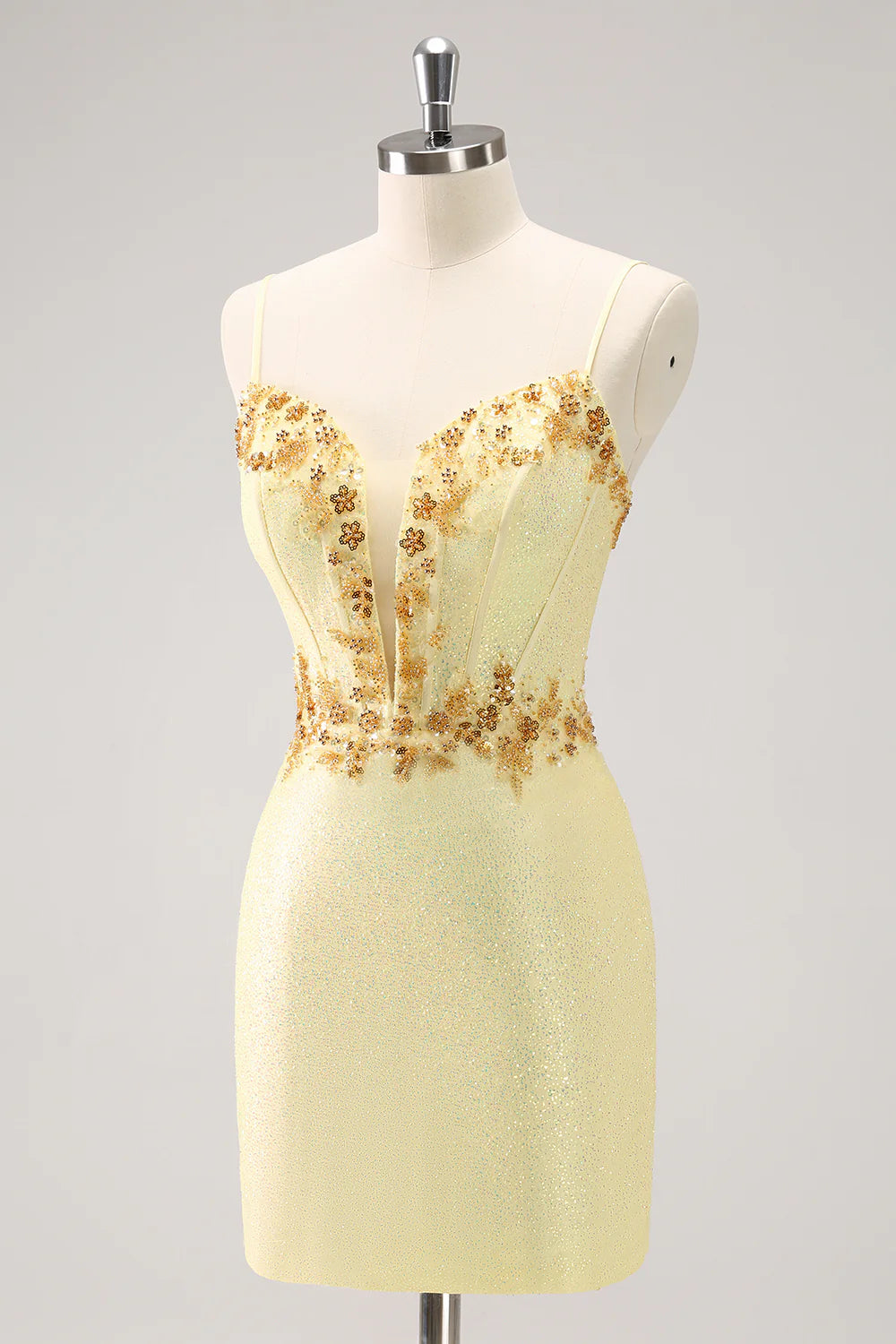 Sparkly yellow bodycon corset dress with beading, back view.