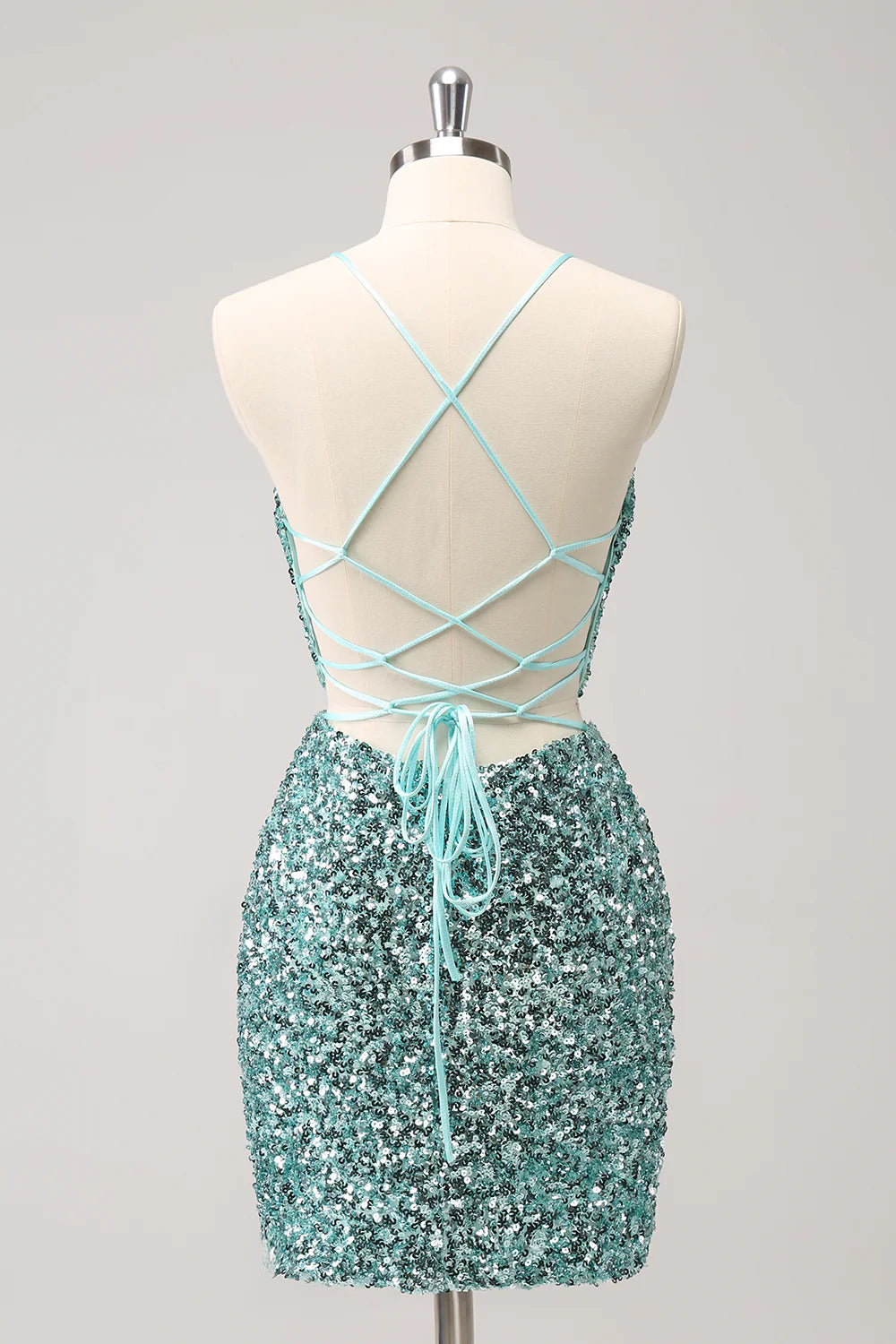 Back view of the blue sequin homecoming dress, highlighting the lace-up detail.
