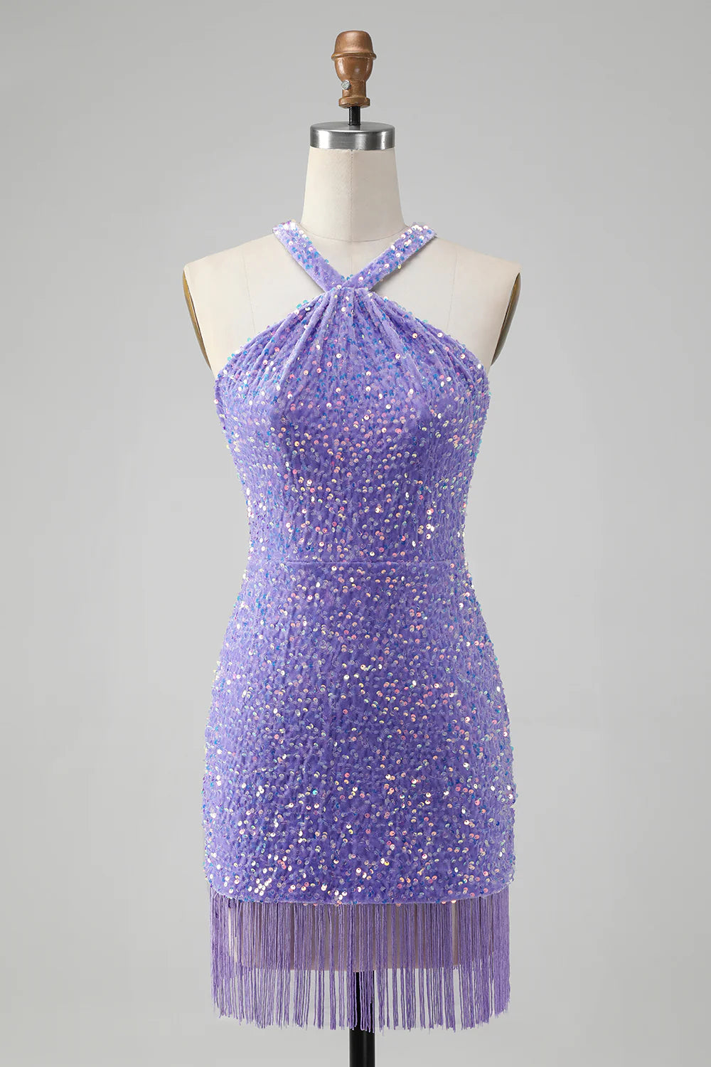 Lilac sequin short dress with halter neckline and tassels.