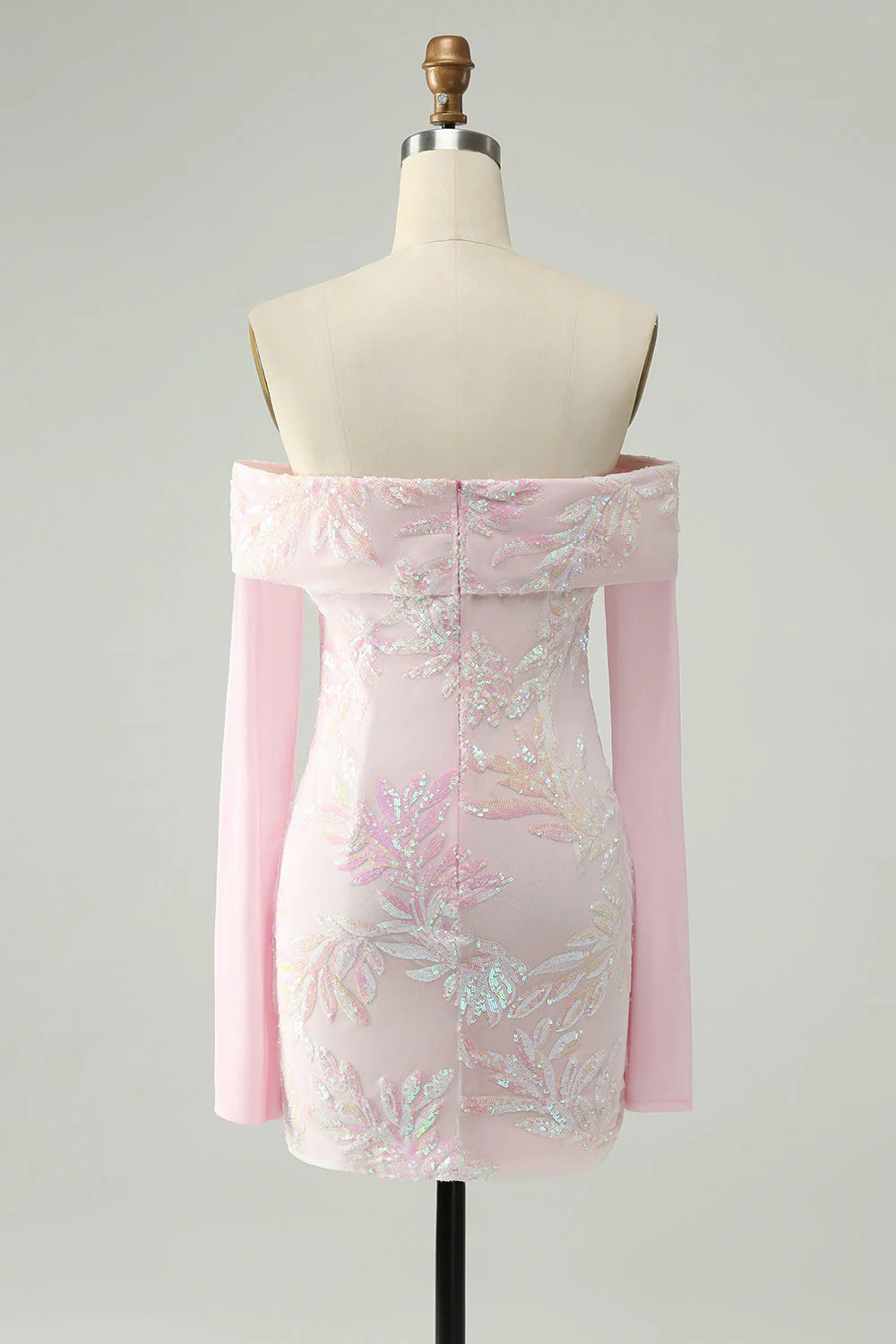 Side view of the pink sequin bodycon dress, highlighting the off-the-shoulder design.