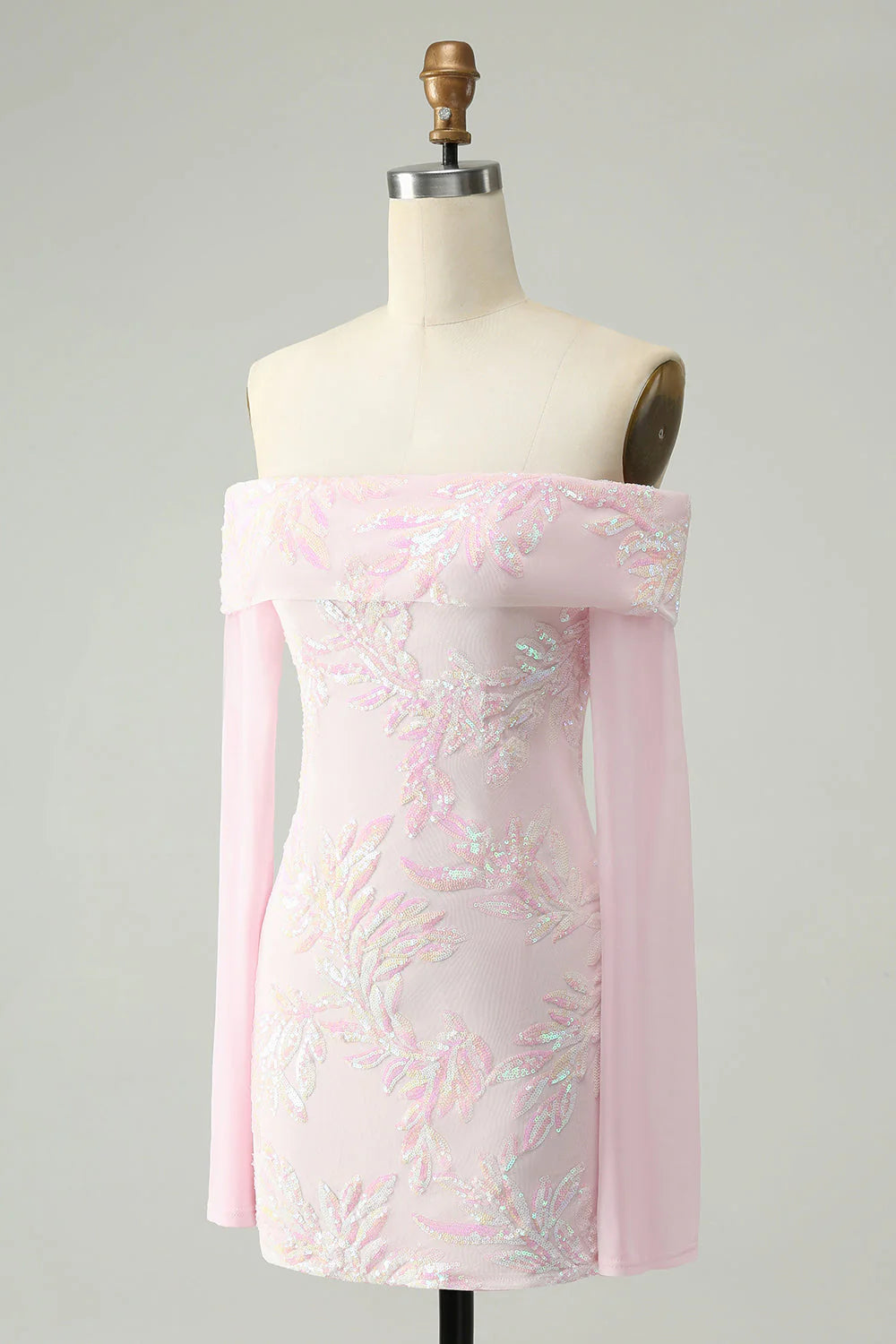 Back view of the sparkly pink sequin bodycon dress with long sleeves.